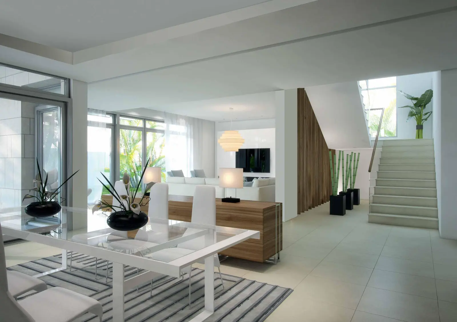 Spacious living room in West Yas villa, Yas Island, Abu Dhabi with high ceilings and large windows featuring Arabic-inspired design
