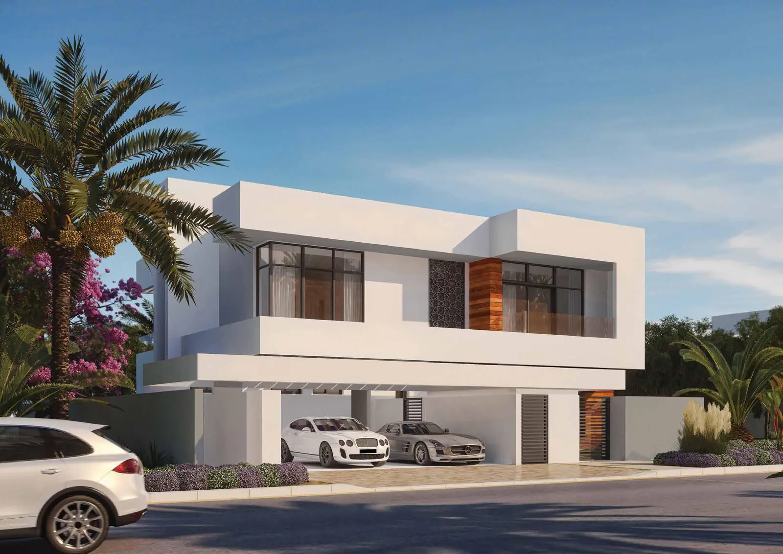 Night view of West Yas villas, Yas Island, Abu Dhabi illuminated with warm exterior lighting