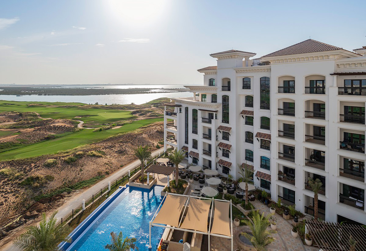 Ansam Residences Yas Island gated community entrance secure exterior access with landscaping