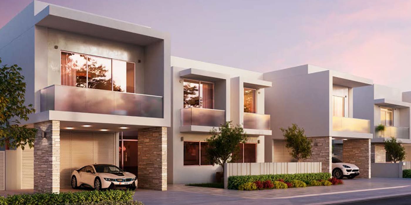 Row of modern townhouses with landscaped front yards at The Cedars.