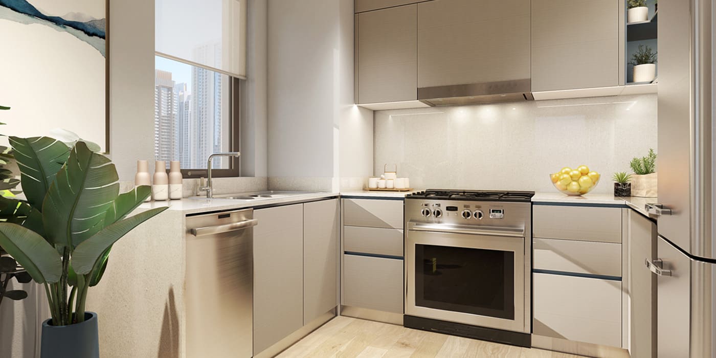 Modern open-plan kitchen and dining space inside a Cedars townhouse.