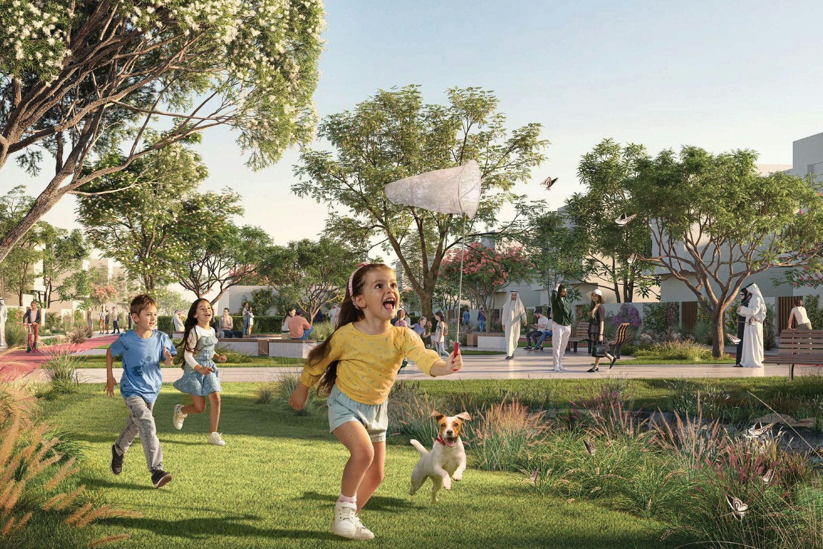 Aerial view of The Sustainable City in Abu Dhabi showcasing eco-friendly apartments, townhouses, and sustainable community living with green spaces and ren
